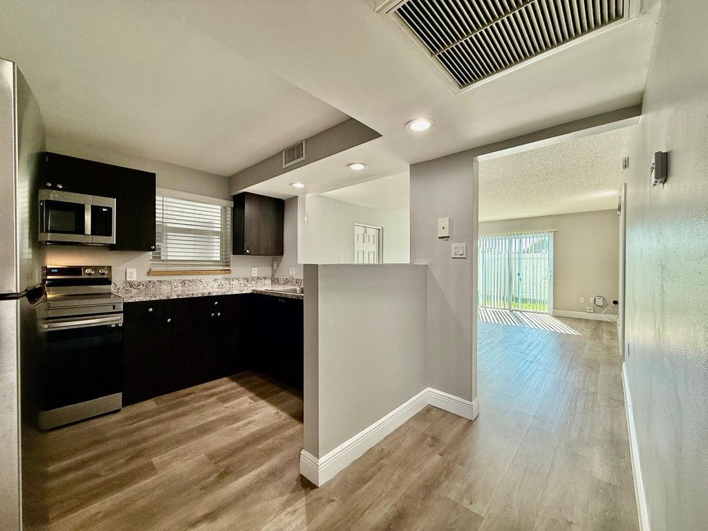 Photo of 708 SW 81st Avenue #5a, North Lauderdale, FL 33068 (MLS # B26009305)