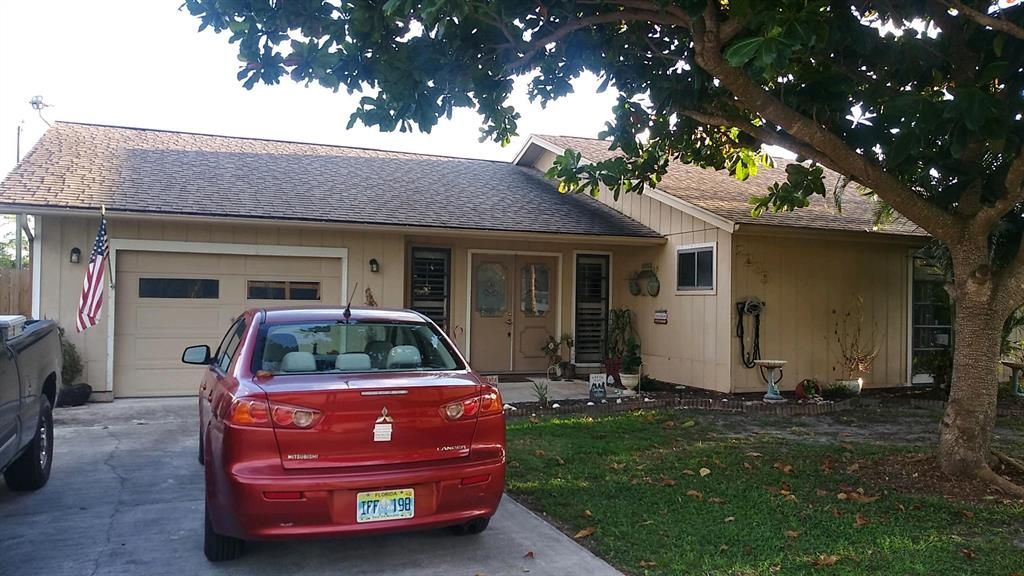 Photo of 2295 SW Edison Circle Cir, Port St Lucie, FL 34953 (MLS # R10766457)