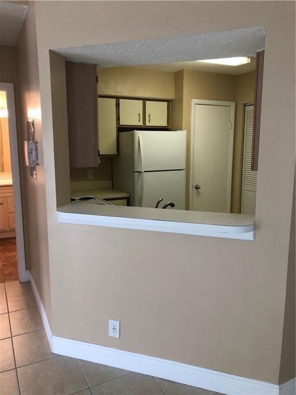 Photo of 815 W Boynton Beach Boulevard #9-201, Boynton Beach, FL 33426 (MLS # F10459921)