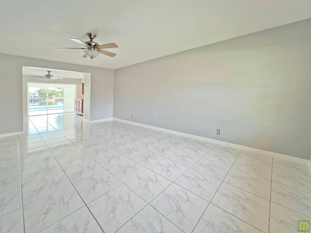 Photo of 3318 NW 68TH Court, Fort Lauderdale, FL 33309 (MLS # B26057007)