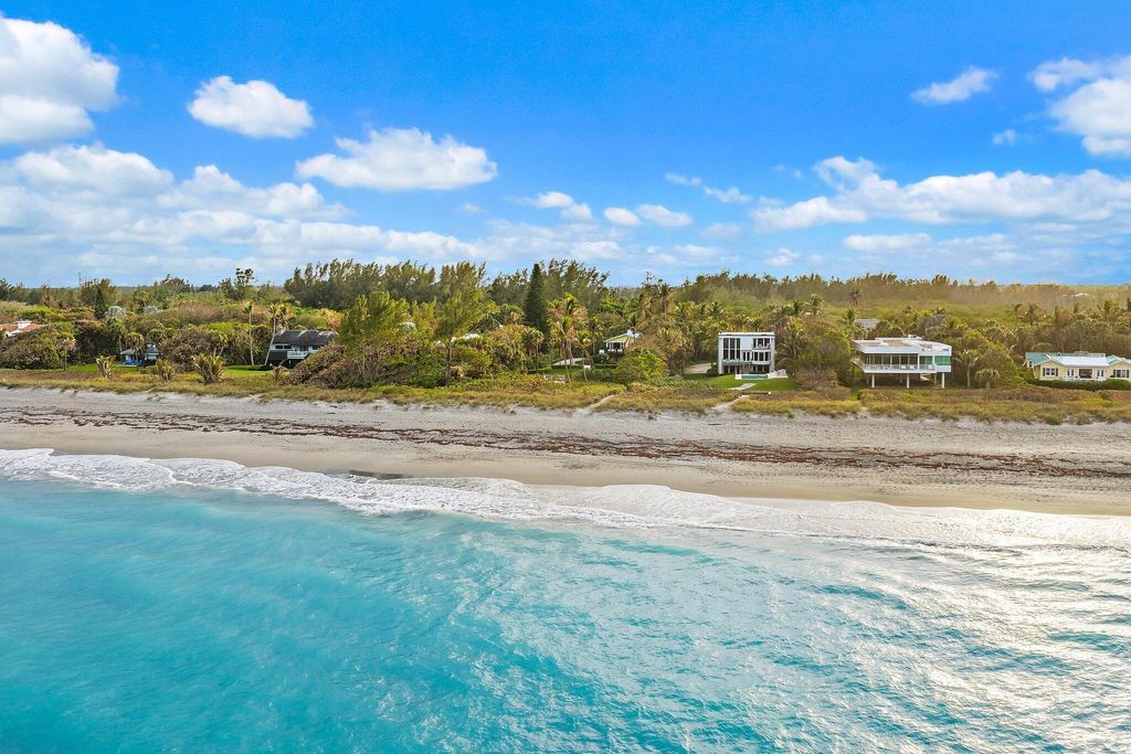 Photo of 31 N Beach Road, Jupiter Island, FL 33455 (MLS # B26003213)