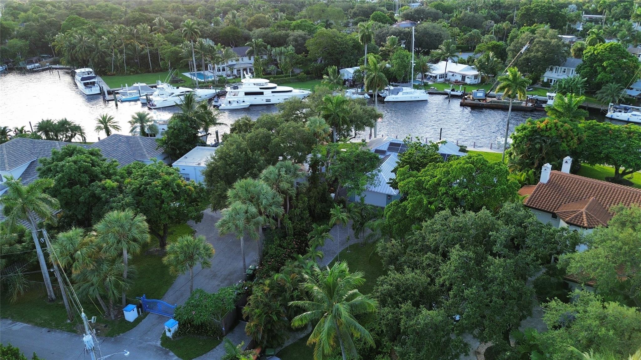 Welcome to Paradise! This incredible lot is situated in the heart of Tarpon River, surrounded by waterfront properties. Nestled between prestigious Coconut Drive and SW 7th Street, this unique home offers privacy with parking access from both sides. Furthermore, it's just one house away from the picturesque New River Park, affording you the opportunity to enjoy the sight of the most prestigious yachts passing by. this lot includes plans for contemporary a two-story home with five bedrooms and four bathrooms, complete with a rooftop, ready to submit. Demolition and tree permits are ready. the estimated sale price is approximately $3 million. An estimate from a general contractor is available. For any further inquiries, please do not hesitate to contact us. Equal Housing Opportunity.