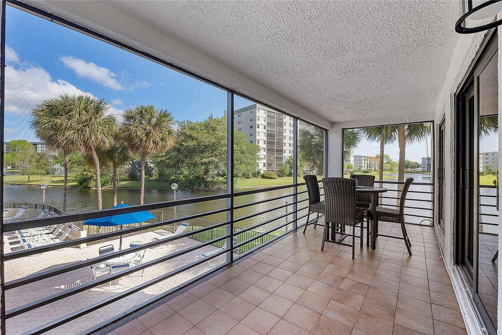 Photo of 2309 S Cypress Bend Drive #211D, Pompano Beach, FL 33069 (MLS # F10439287)