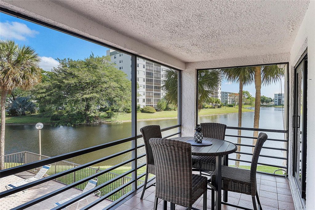 Photo of 2309 S Cypress Bend Drive #211D, Pompano Beach, FL 33069 (MLS # F10439287)