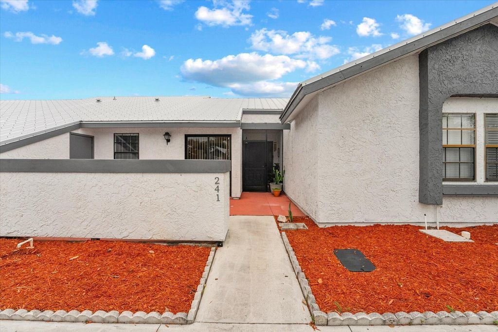 Photo of 241 SW Sterret Circle, Port Saint Lucie, FL 34953 (MLS # R11003875)