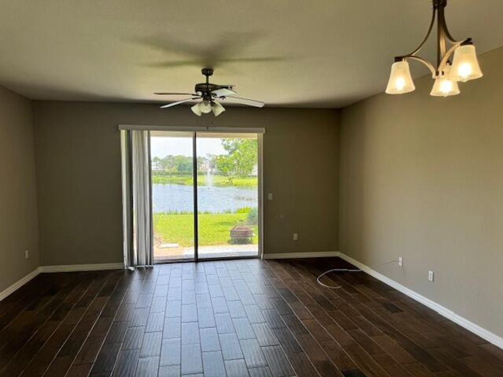 Photo of 1160 Sepia Lane, Lake Worth Beach, FL 33461 (MLS # R11010146)