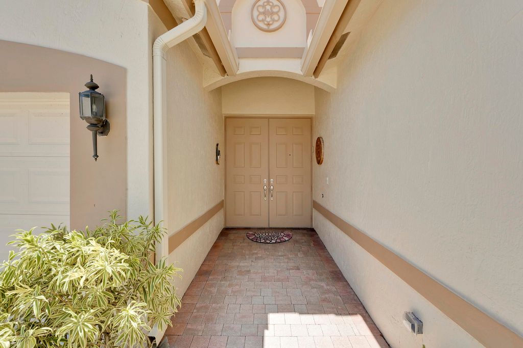 Photo of 9920 Mantova Drive, Lake Worth, FL 33467 (MLS # B26031797)