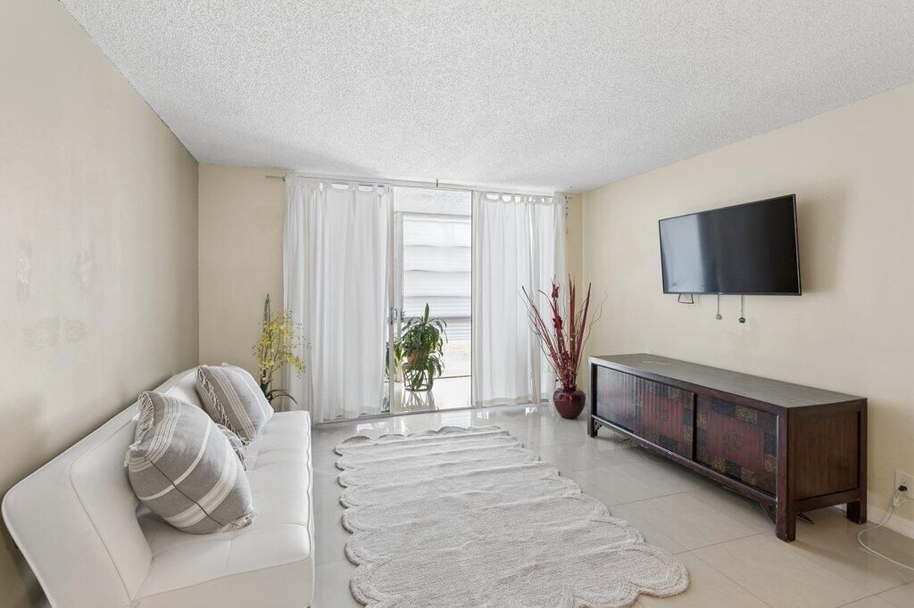 Photo of 3141 NW 47th Terrace #124, Lauderdale Lakes, FL 33319 (MLS # B26009298)