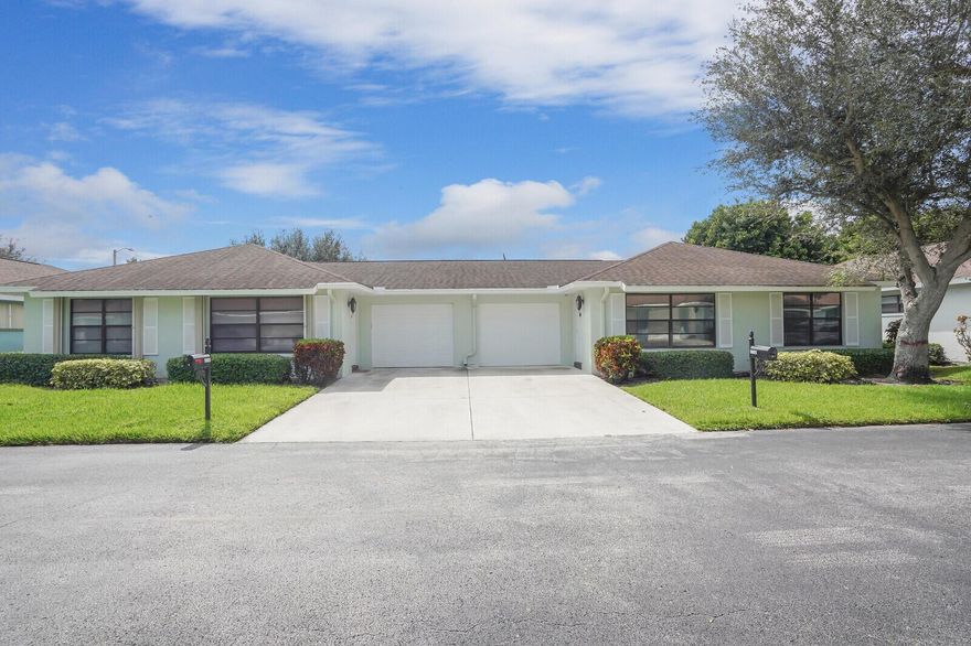 Available now! Lovely 2BR/2BA villa in Bent Tree Villas East, one of Boynton Beach's premier 55+ communities. Just steps away from the pool and clubhouse, this home features an updated A/C (2024) and water heater (2022), along with tasteful interior improvements including high-hat lighting in the living room, modern vanities in the bathrooms and a spacious primary suite with a large walk-in closet. Community amenities include saltwater pool, clubhouse and library, along with activities such as bocce, billiards and darts. To round out this vibrant lifestyle, numerous clubs are available to all!  HOA covers the new Hotwire cable/internet, water, sewer, roof maintenance, building exterior and landscaping.