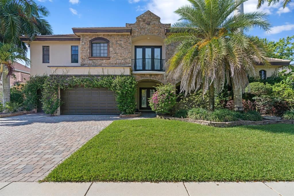 Photo of 10573 Versailles Boulevard, Wellington, FL 33449 (MLS # R10719113)