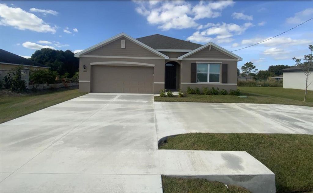 Photo of 3658 SW Port St Lucie Boulevard, Port Saint Lucie, FL 34953 (MLS # R11049507)