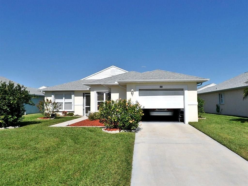 Photo of 406 Paurotis Lane, Fort Pierce, FL 34982 (MLS # R10737151)