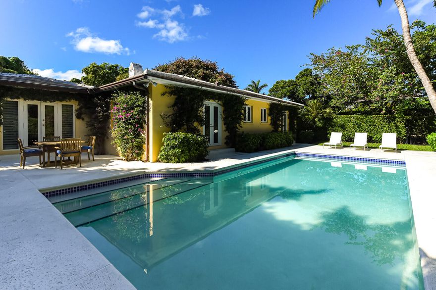 Highly sought after North End Bermuda style 3-BR, 3-BA plus office situated on a 13,504 SqFt lot. Lush tropical landscaping surrounding pool. Impact windows and doors, full house generator, 2-car air-conditioned garage. Versatile property with option to build new on this 13,504SqFt Lot or simply maintain the North End Bermuda charm of existing property. Monterey has lake trail and easy beach access nearby.