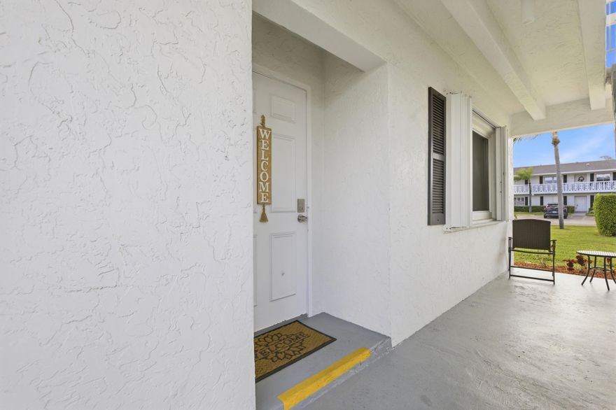 Experience a truly impeccable, top-to-bottom renovation in the highly sought-after Pines of Delray, a vibrant 55+ community. This stunning corner-unit, 2-bedroom, 2-bath residence was completely reimagined in 2023, with no expense spared, offering a level of quality and craftsmanship rarely found in the community.  From the moment you enter, you're welcomed by a bright, open-concept layout enhanced by the removal of walls and smooth-finish ceilings throughout, creating a clean, modern flow. Large-plank porcelain wood-look tile runs seamlessly throughout the entire home, adding both durability and a sophisticated, cohesive design. The redesigned kitchen is both stylish and functional, featuring white shaker cabinetry, beautiful quartzite countertops, and all new appliances — perfectly  positioned to open to the main living area for effortless entertaining and everyday living.  This comprehensive renovation includes impact glass throughout, a new HVAC system (2023), tankless hot water heater, updated electrical with new panel, and all-new plumbing, providing peace of mind and true move-in-ready convenience.  Both bathrooms have been fully updated and thoughtfully reconfigured with modern finishes and enhanced layouts, completing the home's full transformation.  Enjoy abundant natural light from the desirable corner location, along with a spacious patio ideal for relaxing and enjoying the South Florida lifestyle.  This is a rare opportunity to own a fully renovated, turnkey residence in one of Delray Beach's most desirable active adult communities.