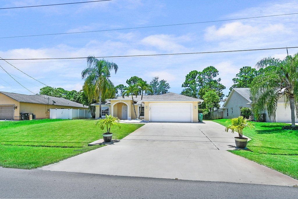 Photo of 1922 SW Janette Avenue, Port Saint Lucie, FL 34953 (MLS # R11001078)