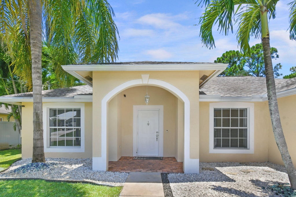 Photo of 1922 SW Janette Avenue, Port Saint Lucie, FL 34953 (MLS # R11001078)