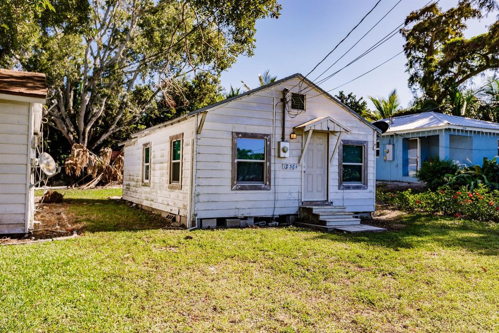 Photo of 12364 Lakeshore Drive, Canal Point, FL 33438 (MLS # R10936590)