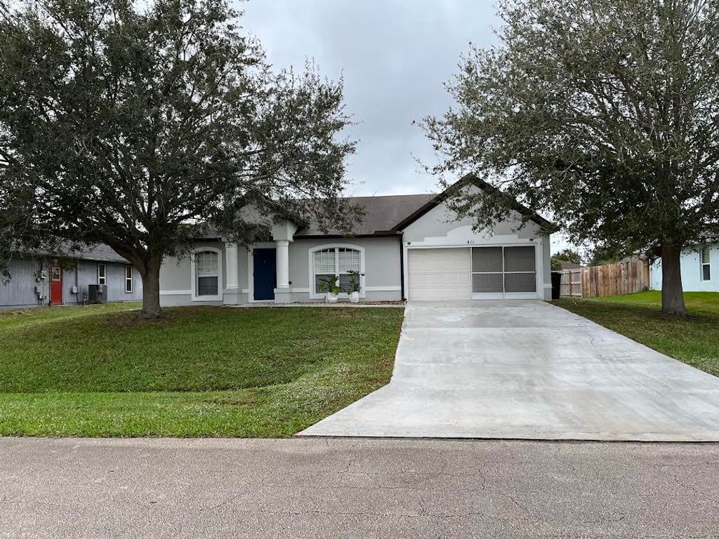 Photo of 411 SW Cahoon Court, Port Saint Lucie, FL 34953 (MLS # R10943821)