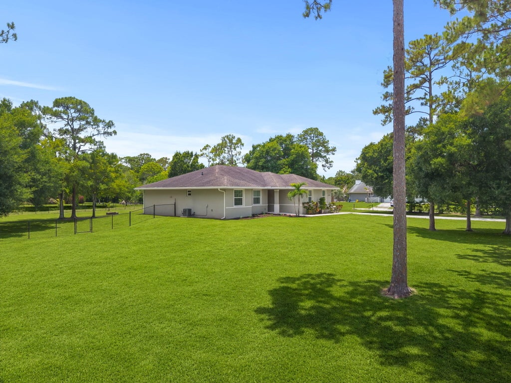 Photo of 13398 N 57th Pl Place N, The Acreage, FL 33411 (MLS # B26041861)