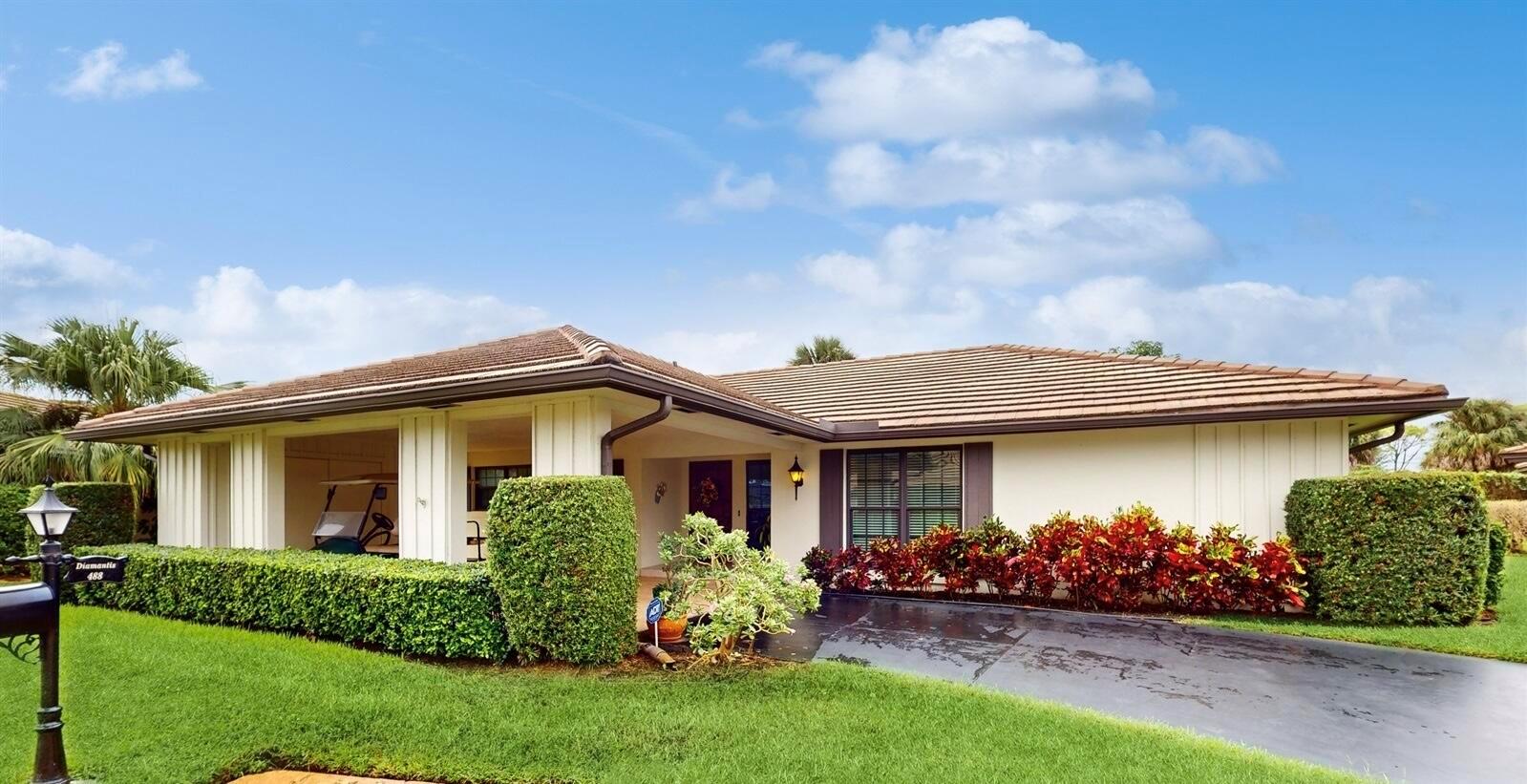 Move in ready, beautiful 3-bedroom, 2 full bath villa is a must see. Updated kitchen and bathrooms. Tile throughout. Garden view. Impact windows and large impact 3 section slider. Large expanded storage area under carport. Beautiful covered screened in patio with reinforced screens for pets. Tile carport.