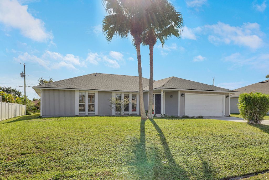 Photo of 1254 SW Asturia Avenue, Port Saint Lucie, FL 34953 (MLS # R11148009)