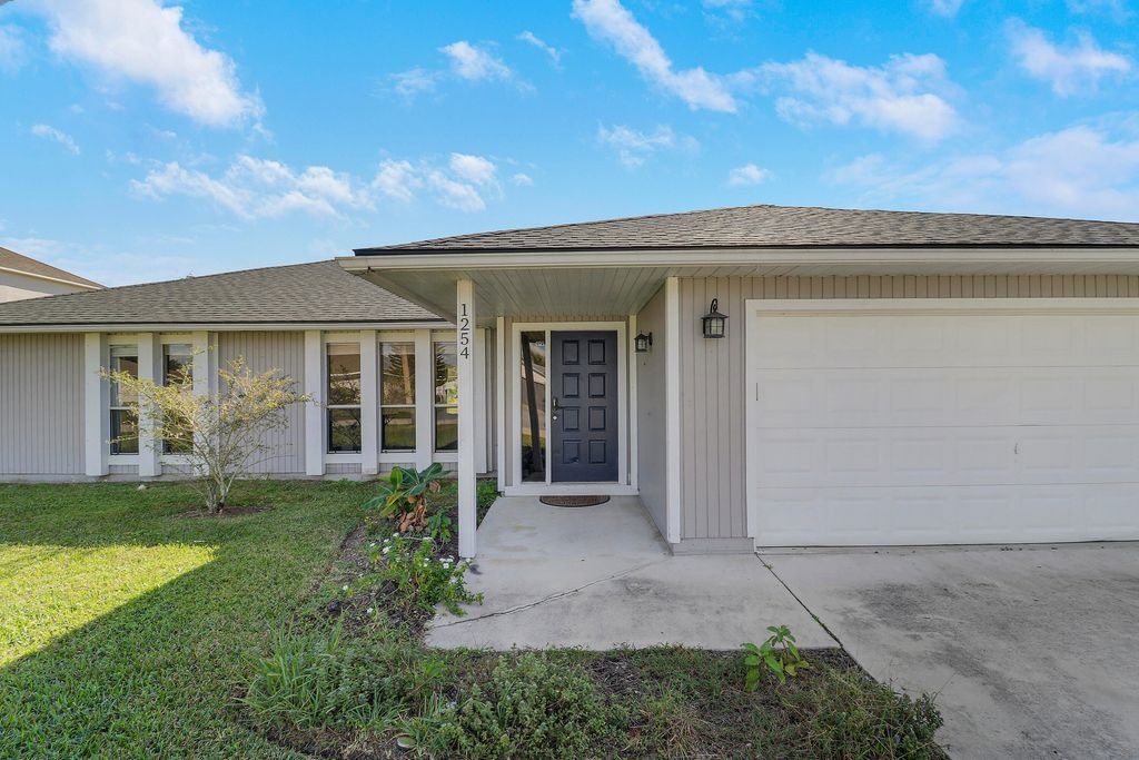 Photo of 1254 SW Asturia Avenue, Port Saint Lucie, FL 34953 (MLS # R11148009)