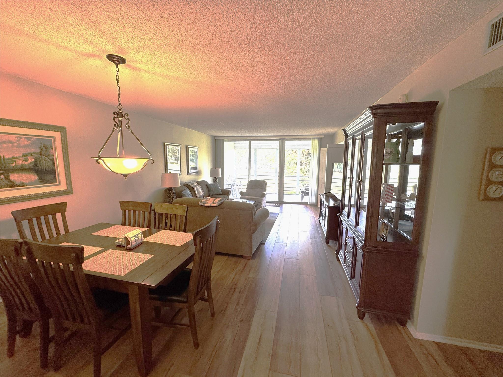 Beautifully updated 2BR/2BA condo in lush Palm Aire with stunning golf course views. Hurricane-impact windows throughout, including patio slider. Luxury vinyl plank flooring, updated baths, newer A/C and water heater. Exceptionally maintained building with strong association. HOA includes cable and internet. All inspections and structural studies completed with excellent financials. Enjoy 2 pools, lush landscaping, and extra storage. Move-in ready, serene, and centrally located!