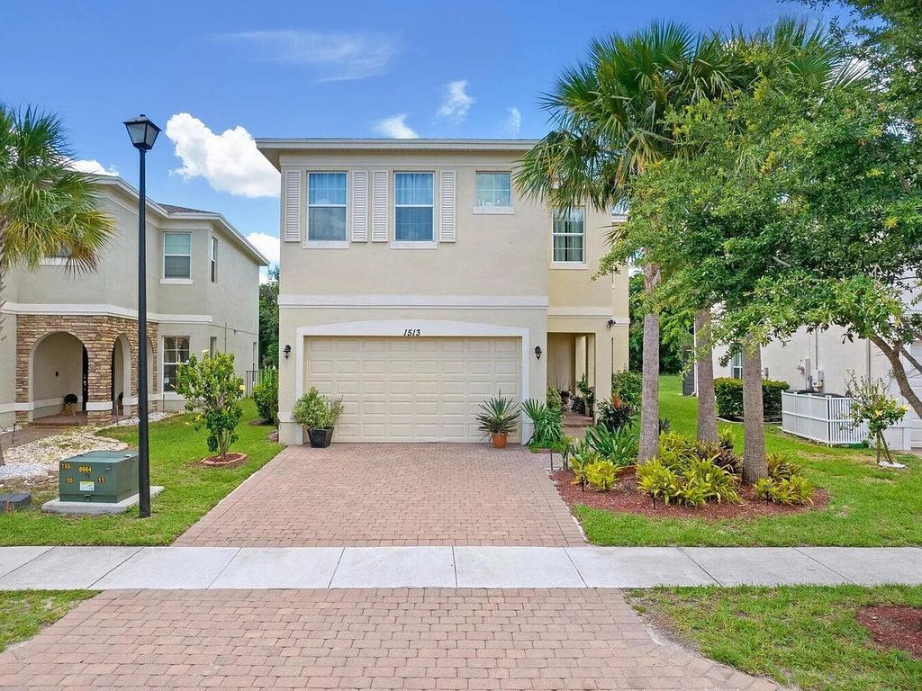 Photo of 1513 NW Cataluna Circle, Port Saint Lucie, FL 34986 (MLS # B26024567)