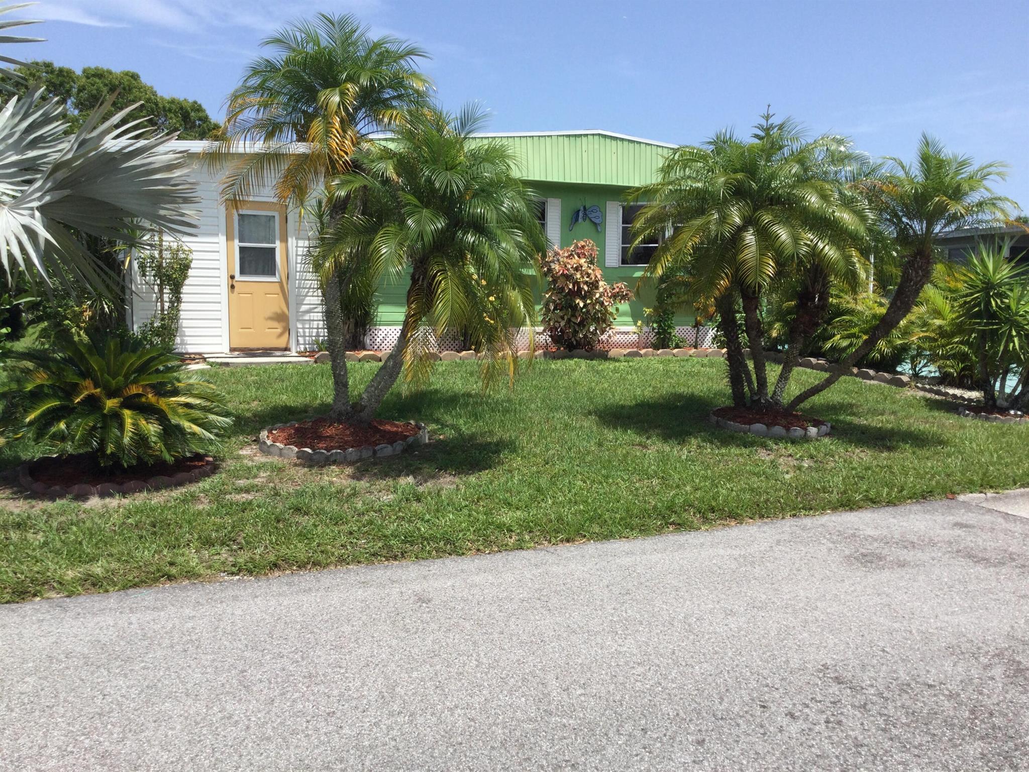 Move in and enjoy all that Spanish Lakes has to offer. Lot rent covers all amenities, taxes, lawn care, sewer and trash removal. Amenities include golf, 2 pools, tennis, pickle ball, shuffleboard, bocce, horse shoes, billiards, ping pong, community room, library, game room, dog park and much much more. Do as much as you like or just relax by the pool.