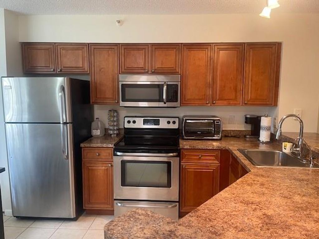 Photo of 2205 S Cypress Bend Drive #106, Pompano Beach, FL 33069 (MLS # F10423500)