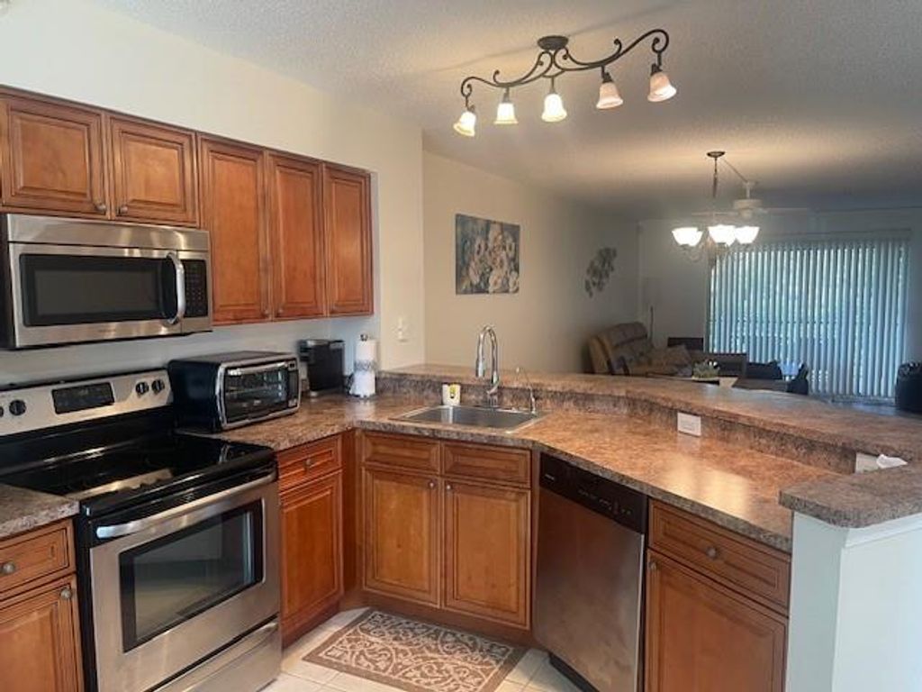Photo of 2205 S Cypress Bend Drive #106, Pompano Beach, FL 33069 (MLS # F10423500)