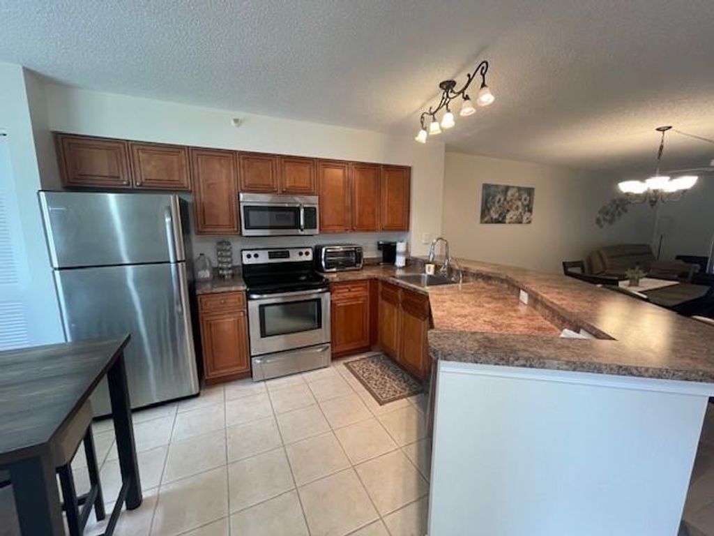 Photo of 2205 S Cypress Bend Drive #106, Pompano Beach, FL 33069 (MLS # F10423500)