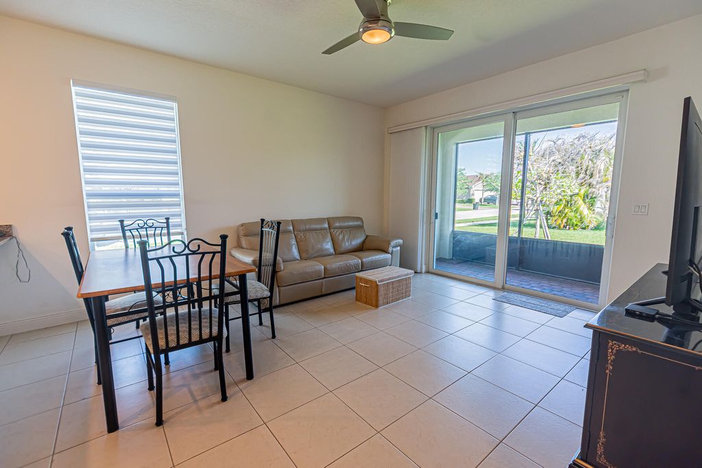 Photo of 9792 SW Trumpet Tree Circle, Port Saint Lucie, FL 34987 (MLS # B26020305)