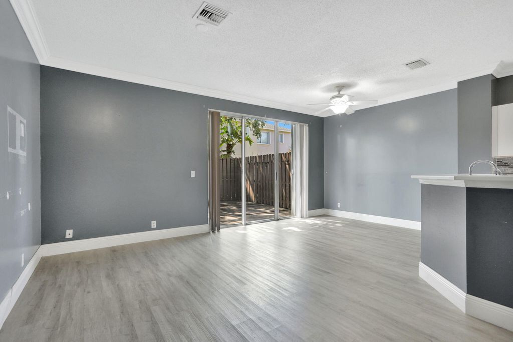 Photo of 839 NW 42 Place, Deerfield Beach, FL 33064 (MLS # R11084639)