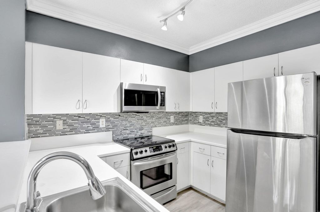 Photo of 839 NW 42 Place, Deerfield Beach, FL 33064 (MLS # R11084639)