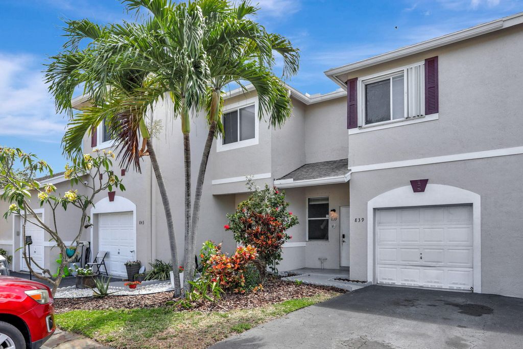 Photo of 839 NW 42 Place, Deerfield Beach, FL 33064 (MLS # R11084639)