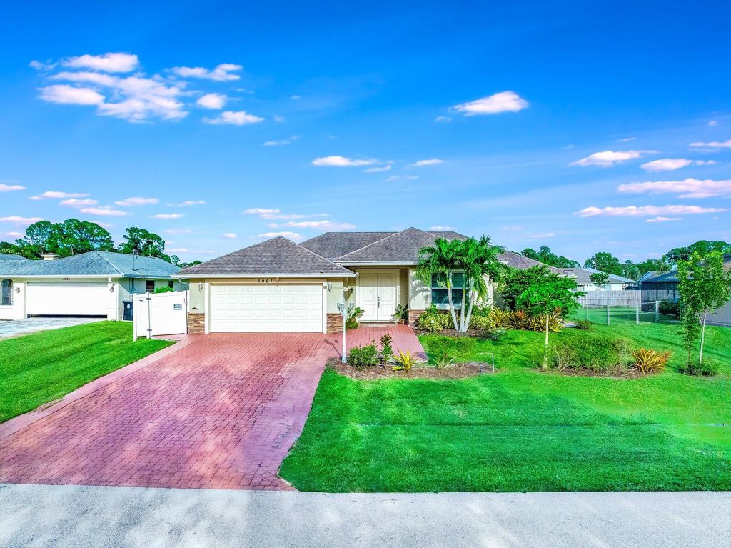 Photo of 3067 SW Segovia Street, Port Saint Lucie, FL 34953 (MLS # R10896915)