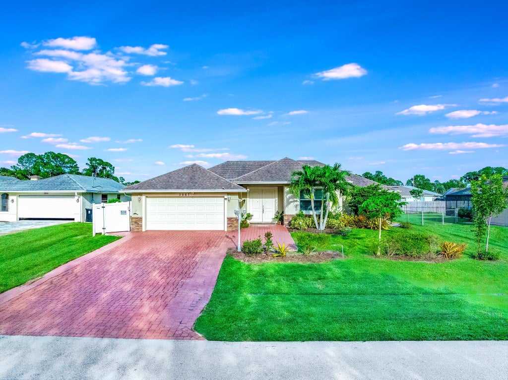 Photo of 3067 SW Segovia Street, Port Saint Lucie, FL 34953 (MLS # R10896915)