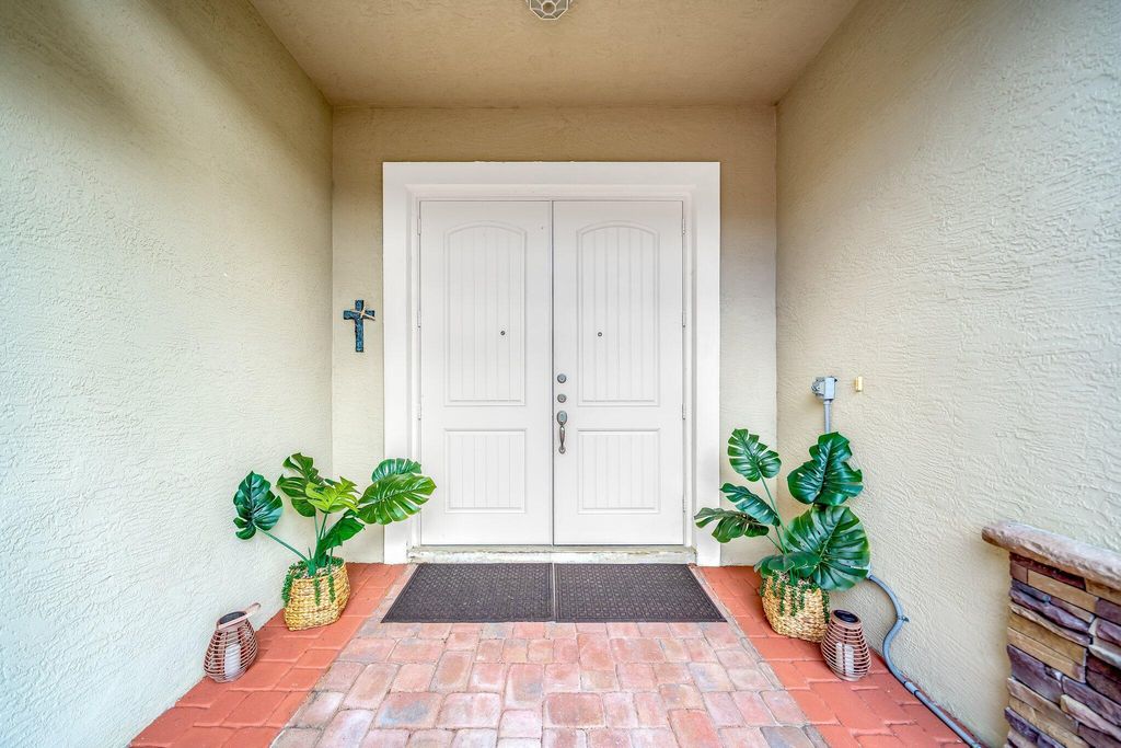 Photo of 3067 SW Segovia Street, Port Saint Lucie, FL 34953 (MLS # R10896915)