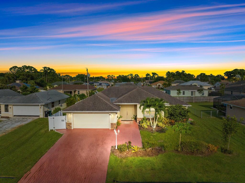 Photo of 3067 SW Segovia Street, Port Saint Lucie, FL 34953 (MLS # R10896915)