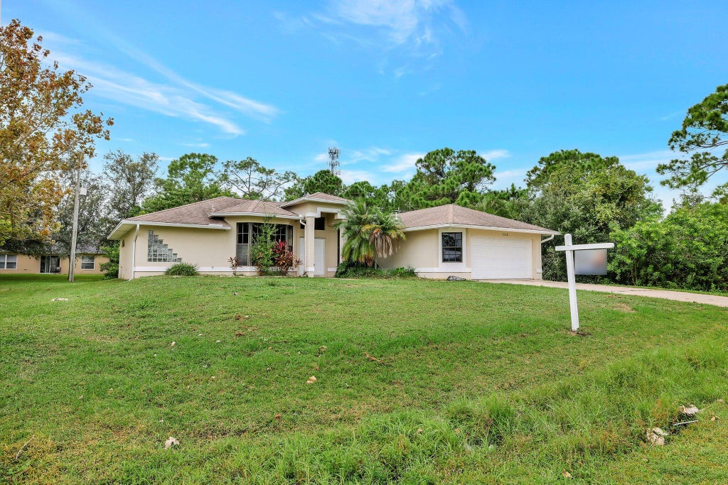 Photo of 2122 SW Burman Lane, Port Saint Lucie, FL 34983 (MLS # R11031686)