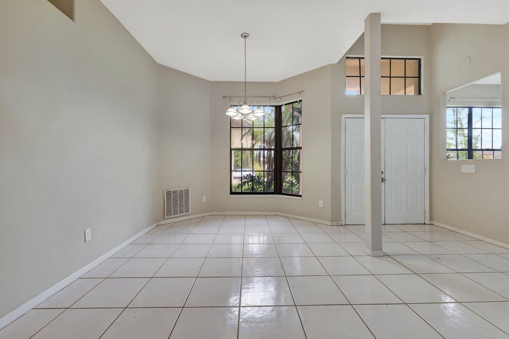 Photo of 2122 SW Burman Lane, Port Saint Lucie, FL 34983 (MLS # R11031686)