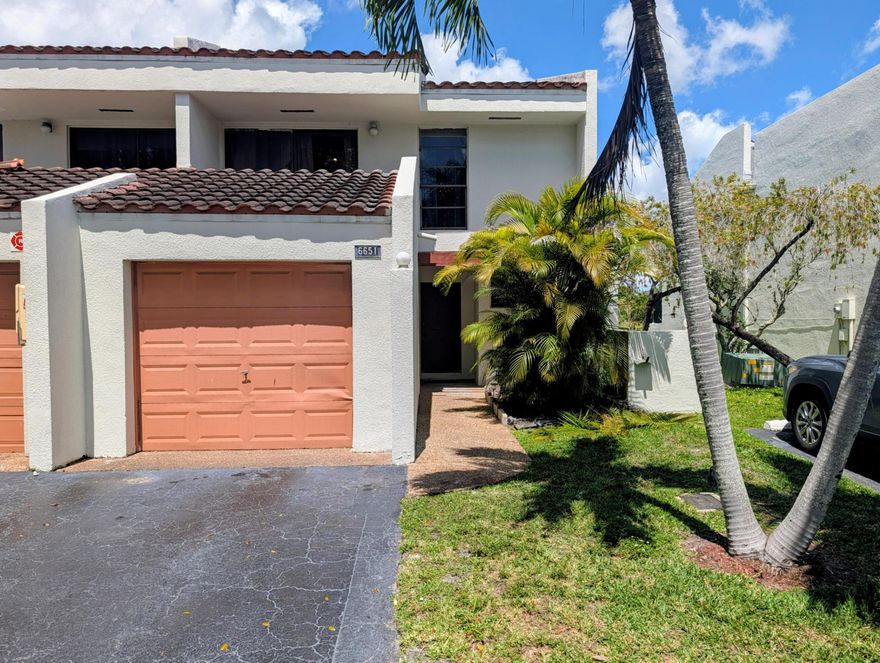Spacious centrally located townhome in the gated Courts of Inverrary community with stunning water and golf course views. Enjoy peaceful lake views from the screened patio and private balcony off the spacious primary bedroom. The first floor features recently updated tile flooring and a bright open living and dining area. A rare full bathroom downstairs offers added convenience for guests. The garage has been partially converted into a flexible  space perfect for an office, gym, or playroom. Community amenities include a pool and fitness center. Great opportunity to own a home with exceptional views and a functional layout.