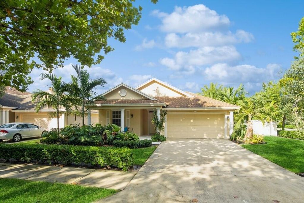 Photo of 350 Clocktower Drive, Jupiter, FL 33458 (MLS # R10922460)