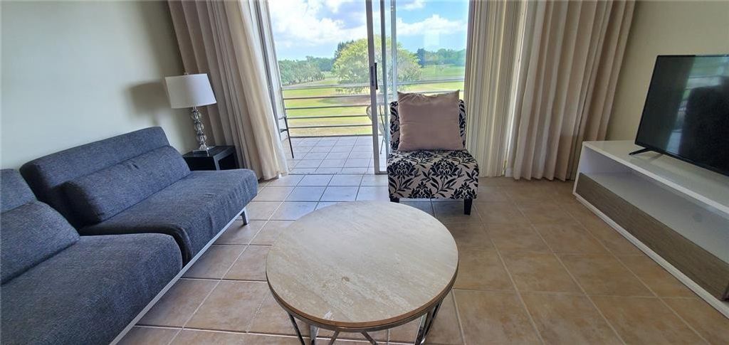 Photo of 5100 SW 90th Avenue #406, Cooper City, FL 33328 (MLS # F10538096)