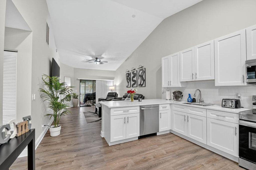 Photo of 3981 Island Club Circle W, Lake Worth, FL 33462 (MLS # R11104986)