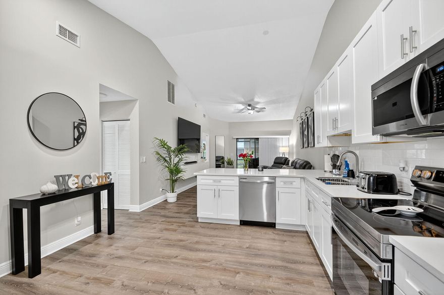 Waterfront single-story villa with garage and new community roofs — now offered at $339,000!
This fully renovated home in Island Club offers peaceful water views, vaulted ceilings, and a bright open layout in a quiet residential setting. The kitchen features white shaker cabinetry, quartz countertops, and stainless steel appliances, with living spaces that flow comfortably for both everyday living and entertaining!
The home is single-level and includes a private garage, providing convenience and functionality rarely found in this price range! Generous room sizes and natural light create a spacious feel throughout, while the association maintains exterior elements for a low-maintenance lifestyle!
The community recently completed new roofs throughout the neighborhood ...! Waterfront single-story villa with garage and new community roofs  now offered at $339,000!

This fully renovated home in Island Club offers peaceful water views, vaulted ceilings, and a bright open layout in a quiet residential setting. The kitchen features white shaker cabinetry, quartz countertops, and stainless steel appliances, with living spaces that flow comfortably for both everyday living and entertaining!

The home is single-level and includes a private garage, providing convenience and functionality rarely found in this price range! Generous room sizes and natural light create a spacious feel throughout, while the association maintains exterior elements for a low-maintenance lifestyle!

The community recently completed new roofs throughout the neighborhood, adding long-term value and peace of mind for ownership!

Island Club is centrally located in Palm Beach County, tucked away from heavy traffic yet just minutes from beaches, shopping, dining, medical centers, and major roadways. The location offers easy access to everything South Florida has to offer while maintaining a quiet neighborhood atmosphere!

Waterfront properties with renovations, a garage, and single-story living at this price point are limited. Schedule your private showing today!