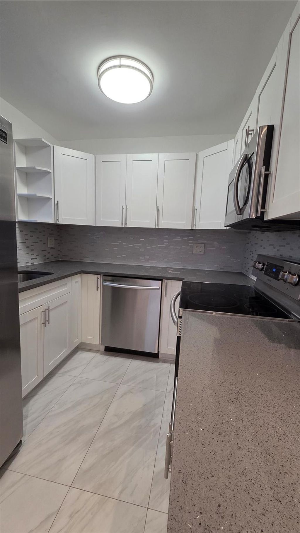 Photo of 5375 SW 40th Avenue #105, Fort Lauderdale, FL 33314 (MLS # F10556722)