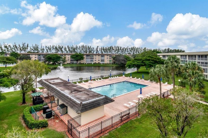 Fantastic LAKE/POOL VIEW from this Large IRIS MODEL with WASHER/DRYER Inside Plus HURRICANE SHUTTERS THRU-OUT and GLASS ENCLOSED PATIO. ASSOCIATION REQUIRES ONE OCCUPANT 55+ WITH 15% DOWN AND WYNMOOR INCOME FORMULA AND A CREDIT SCORE OF 700 PLUS $250 REFUNDABLE MOVE-IN FEE. Information Deemed Reliable but, Not Guaranteed.