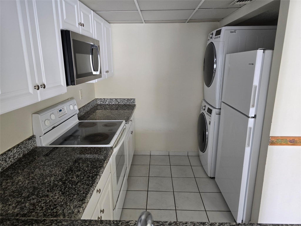 Photo of 10050 Winding Lake Road #103, Sunrise, FL 33351 (MLS # B26014826)